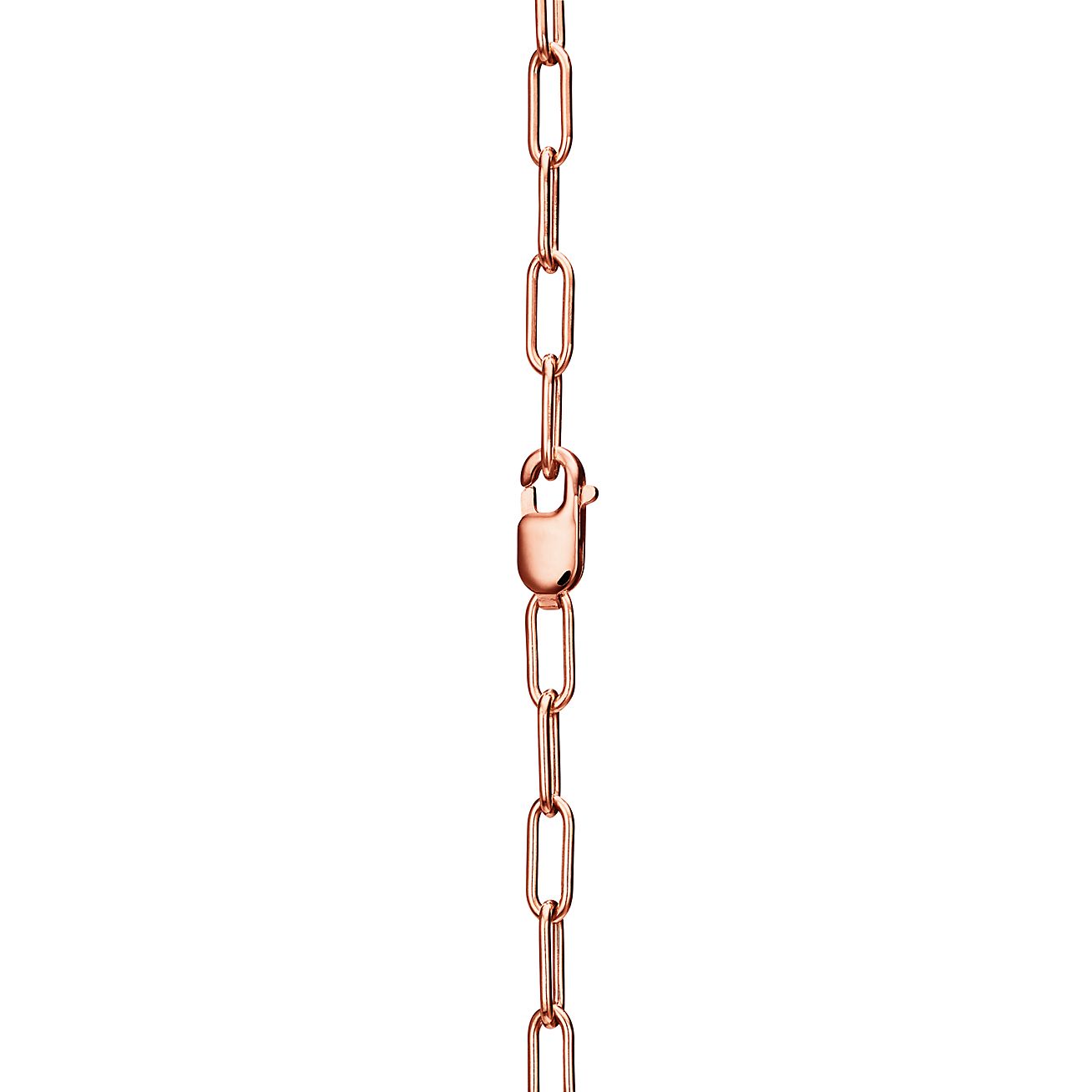 Collier avec pendentif T Lock en 18 carats et diamants pavés