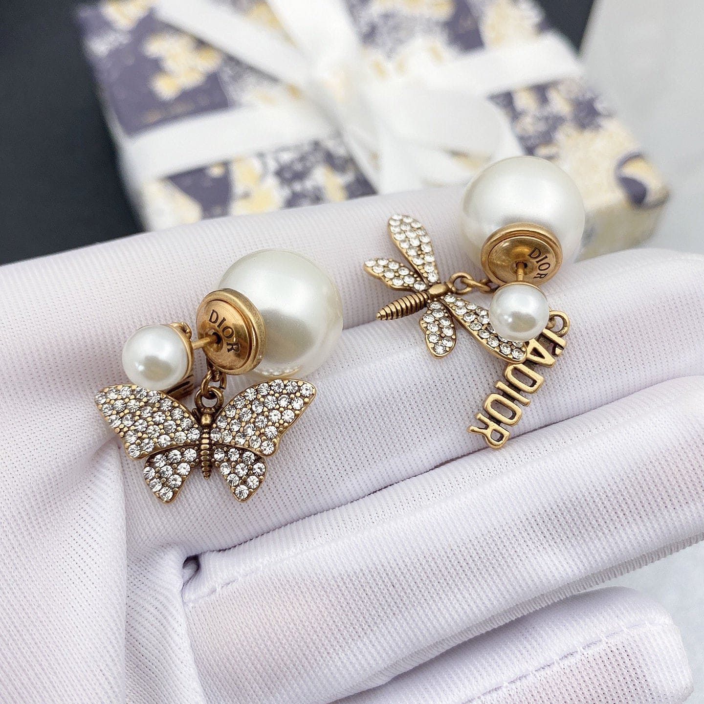 Boucles d'oreilles en perles libellule/papillon CD 18K