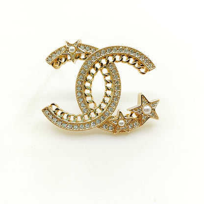 18K CHANEL CC Star Crtystal Brooch