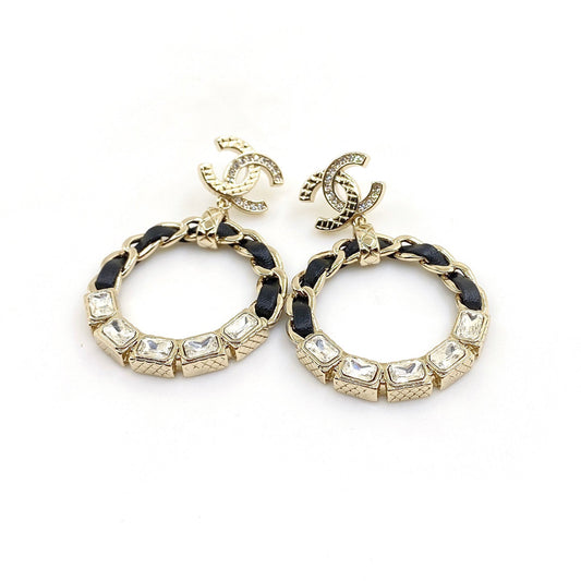 18k CHANEL CC Leather Cricle Earrings