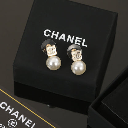 Boucles d'oreilles en perles CC 18 carats