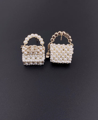 Boucles d'oreilles en perles de petit sac CC 18 carats