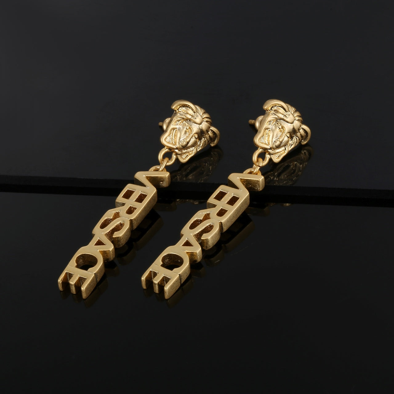 Boucles d'oreilles Méduse 18 carats