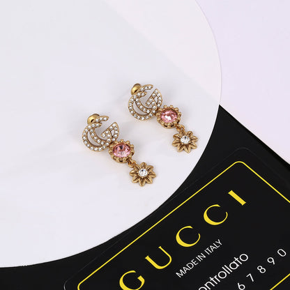 Boucles d'oreilles en cristal de fleur Double G 18 carats