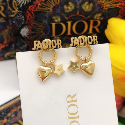 Boucles d'oreilles étoile J'Adior CD 18 carats