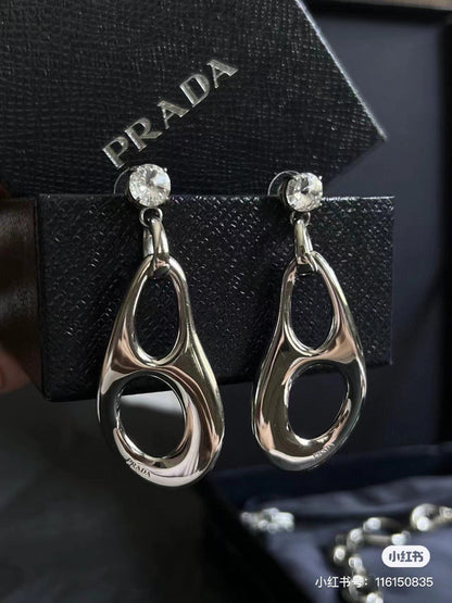 Boucles d'oreilles triangle inversé 18 carats