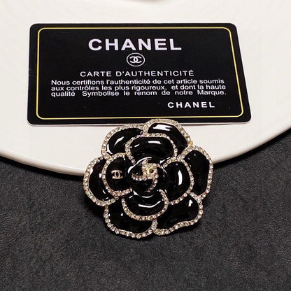 18K CHANEL Black Flower Brooch