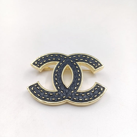 18K CHANEL CC Black Brooch