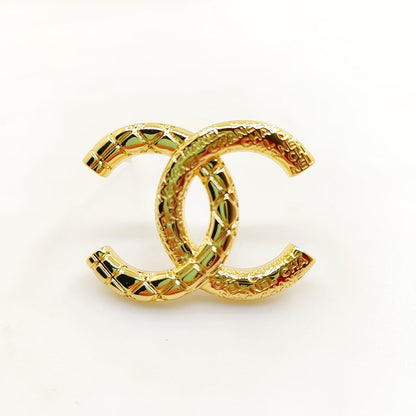 18K CHANEL CC 24S Brooch