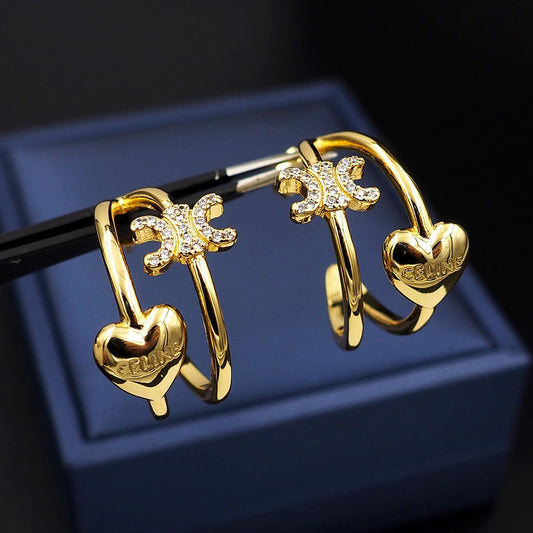 Boucles d'oreilles coeur Triomphe 18 carats