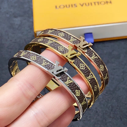 Bracelet vintage en cuir Louis 18 carats