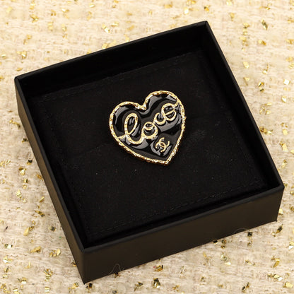 Broche coeur noir 18K CC