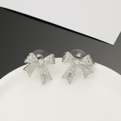 Boucles d'oreilles diamants nœud papillon CC 18 carats