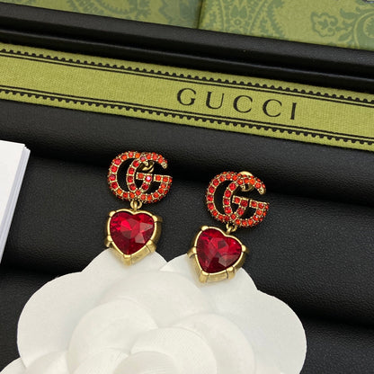 Boucles d'oreilles en cristal rouge Double G 18 carats