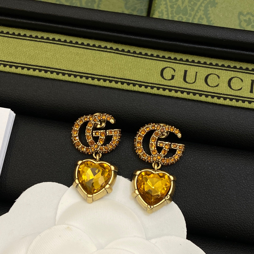 Boucles d'oreilles en cristal jaune Double G 18 carats