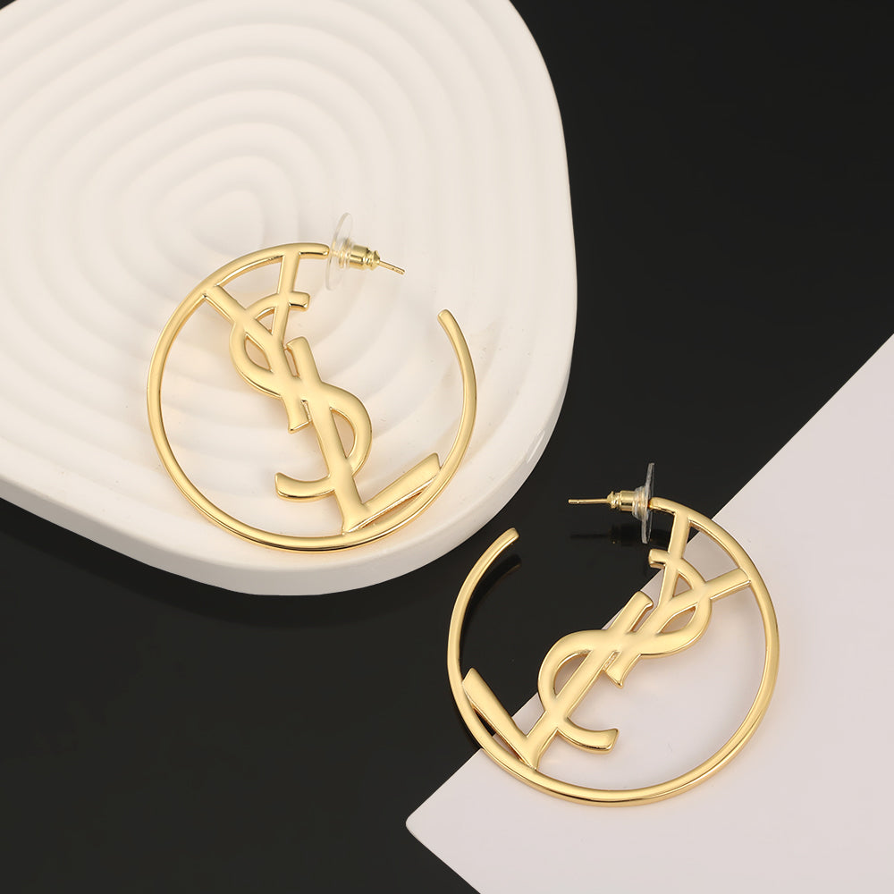 Boucles d'oreilles monogramme Sanit 18 carats