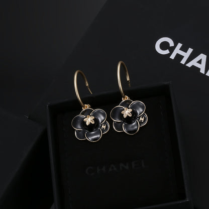 Boucles d'oreilles à fleurs CC 18 carats