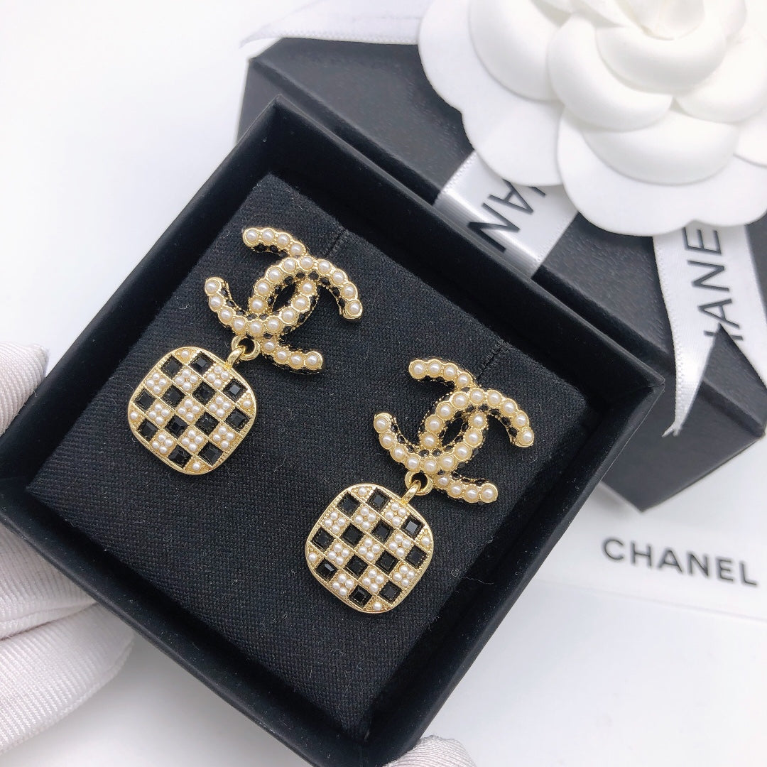 Boucles d'oreilles chaîne CC 18 carats