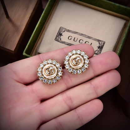 Boucles d'oreilles en cristaux de fleurs Double G 18 carats