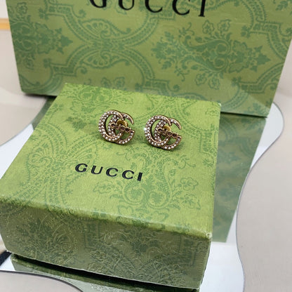 Boucles d'oreilles en diamants avec logo Double G 18 carats