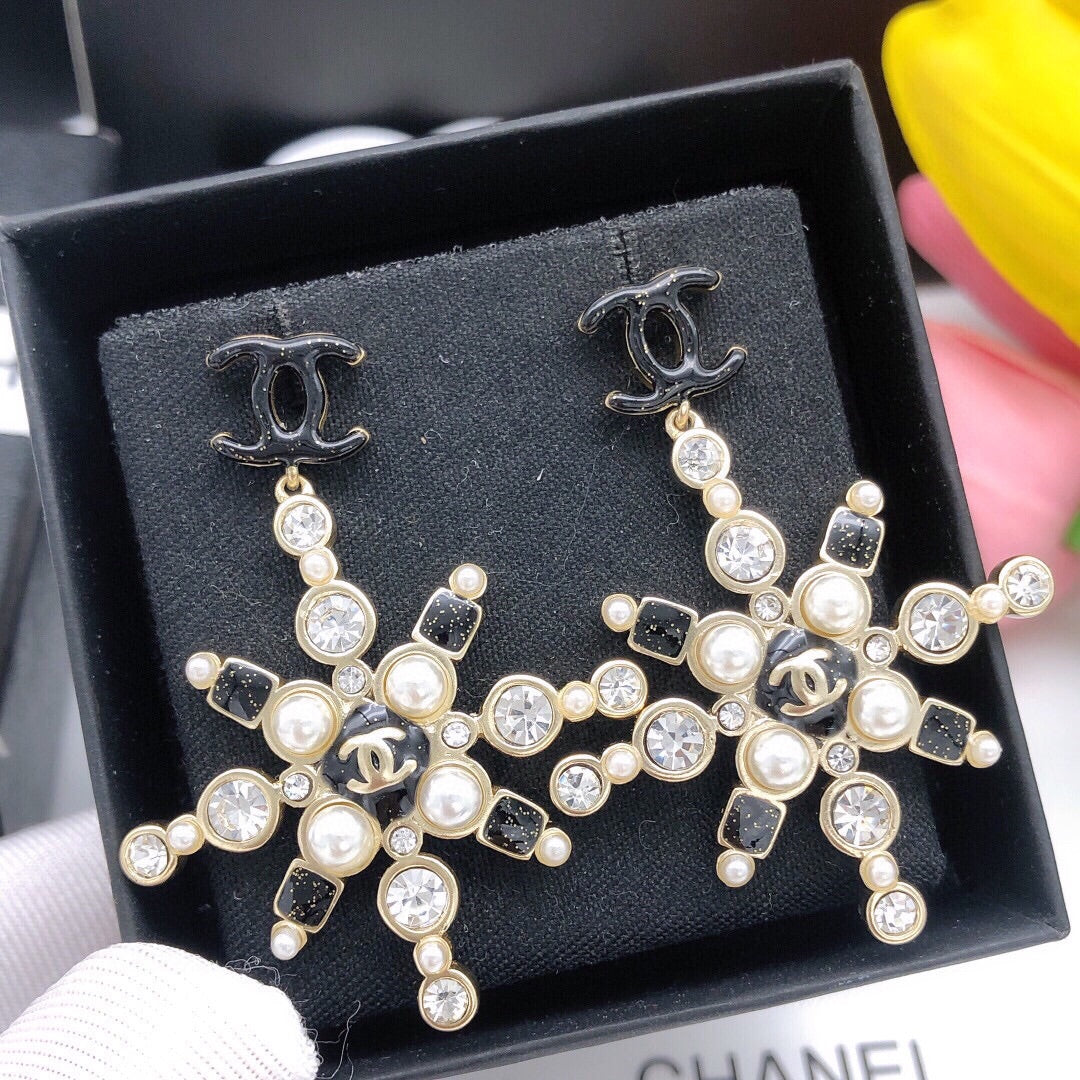 Boucles d'oreilles fleurs de neige CC 18 carats