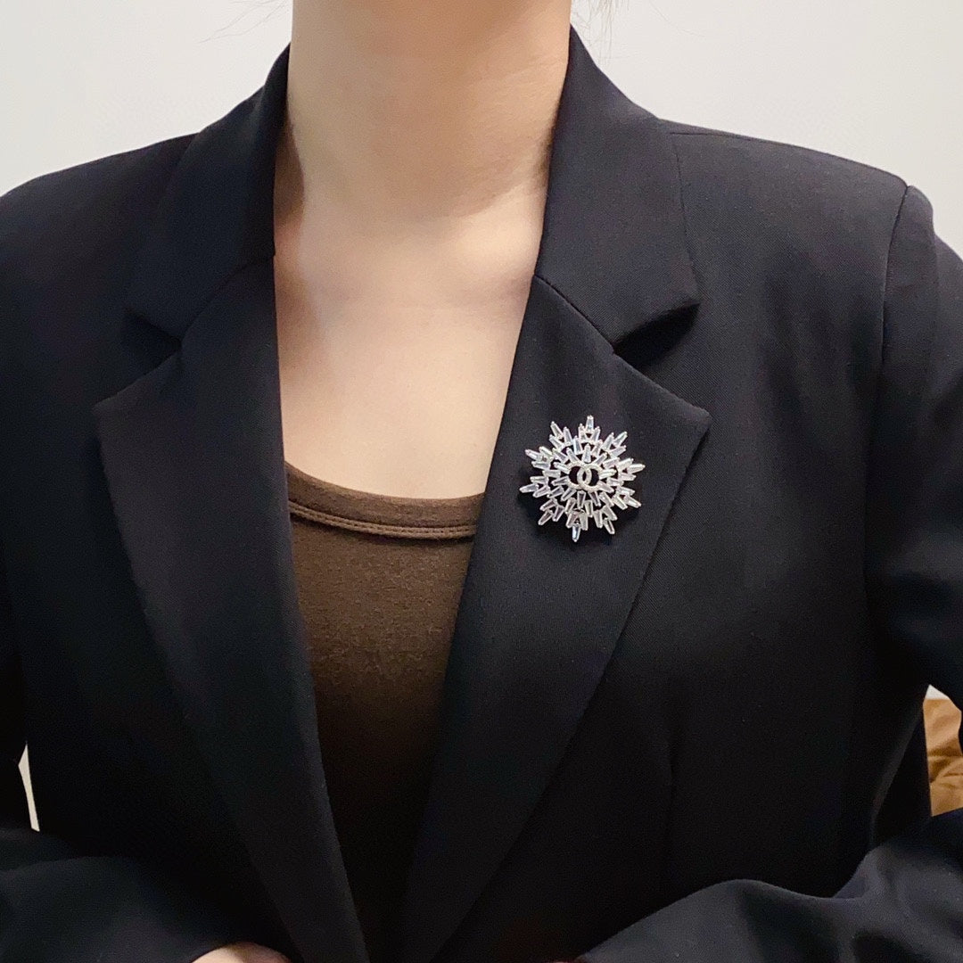 Broche fleur de neige 18K CC