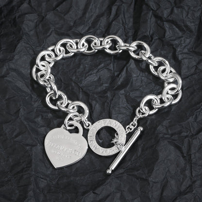 Bracelet étiquette cœur T 18 carats