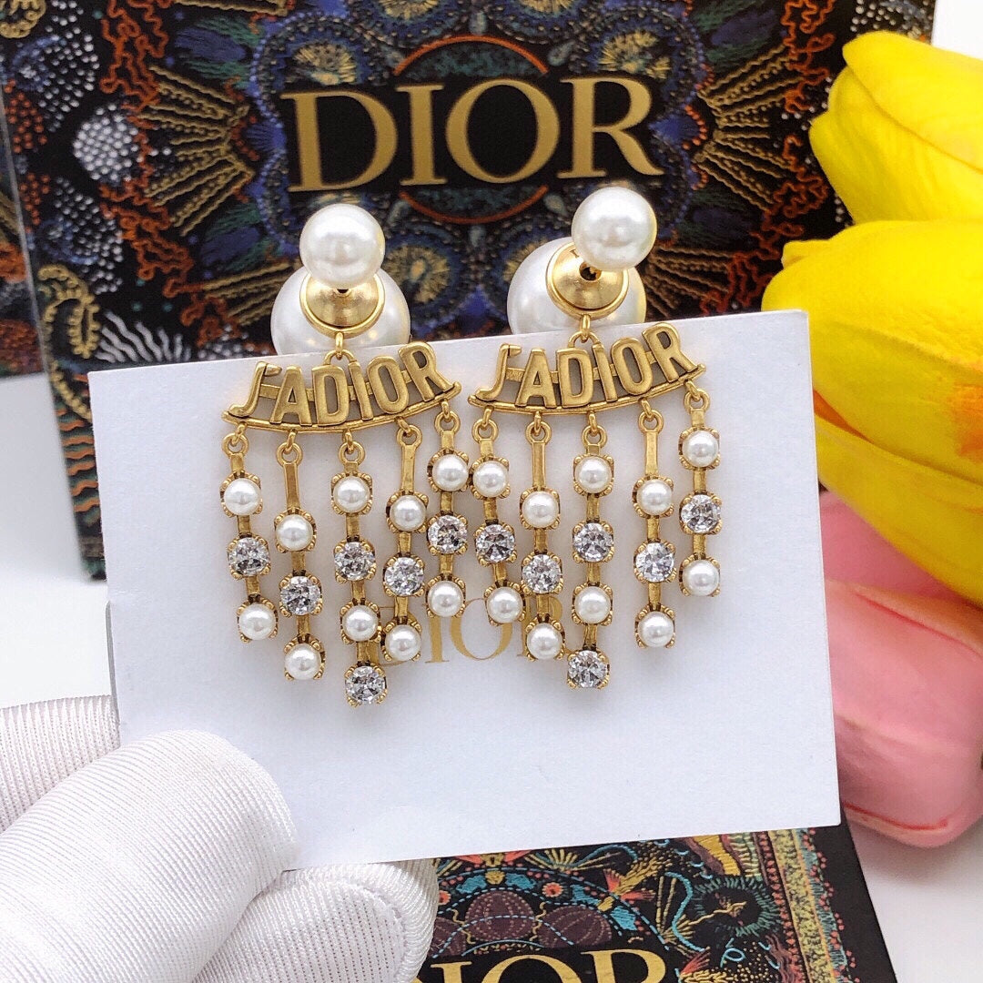 Boucles d'oreilles en perles CD J'Adior 18 carats