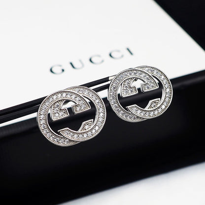 Boucles d'oreilles diamants Double G 18 carats