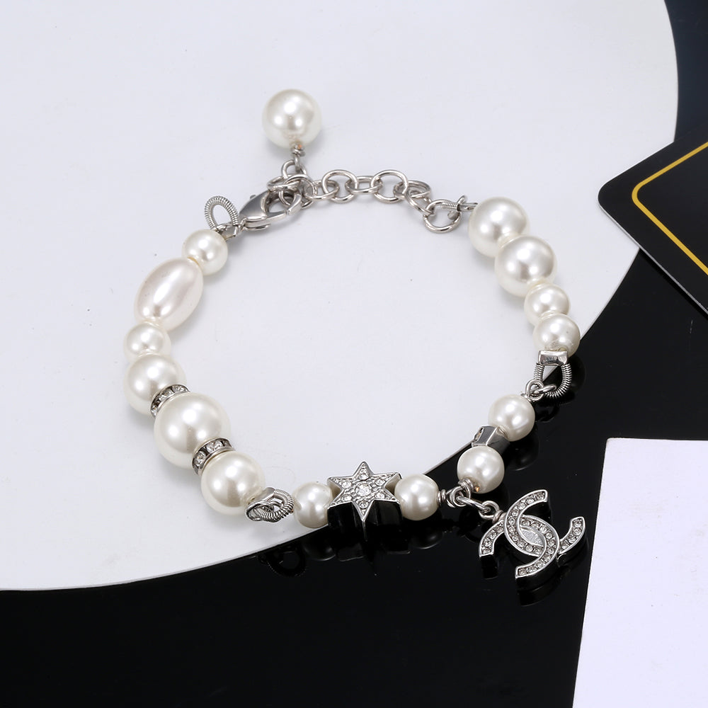 Bracelet chaîne en perles CC 18 carats