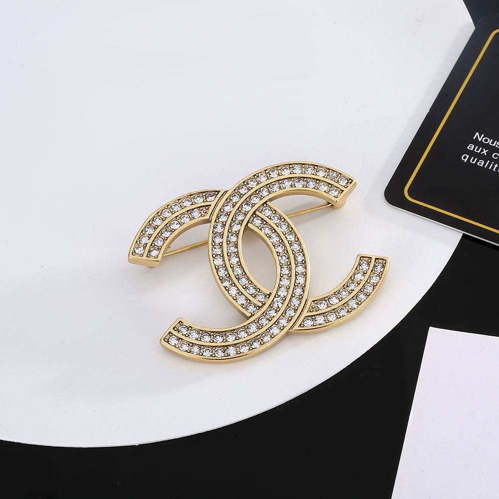 18K CC Diamonds Brooch