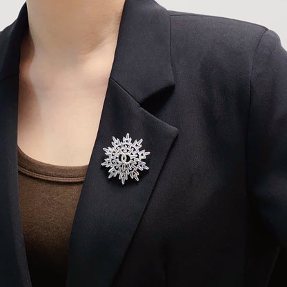 Broche fleur de neige 18K CC