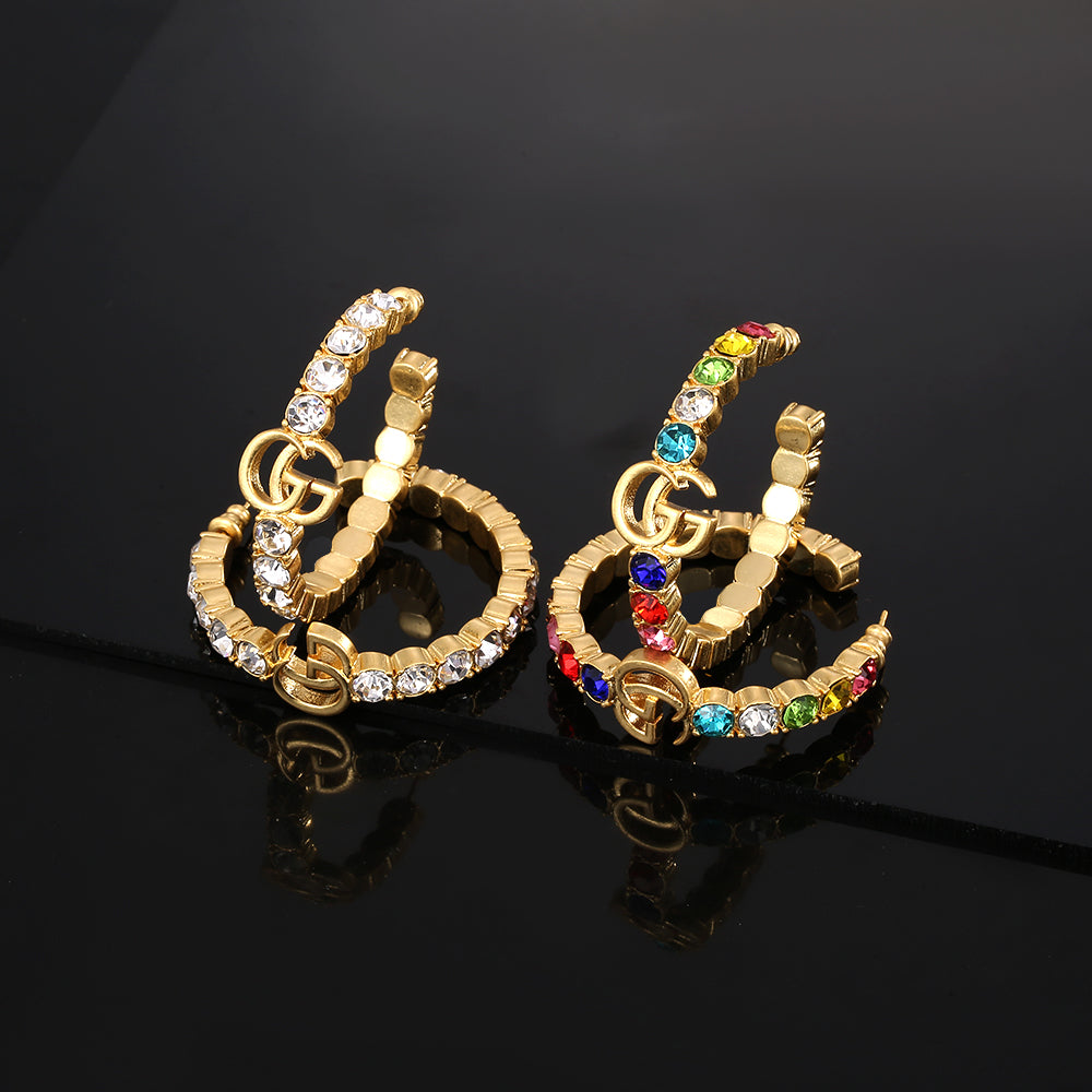 Boucles d'oreilles cercle double G 18 carats