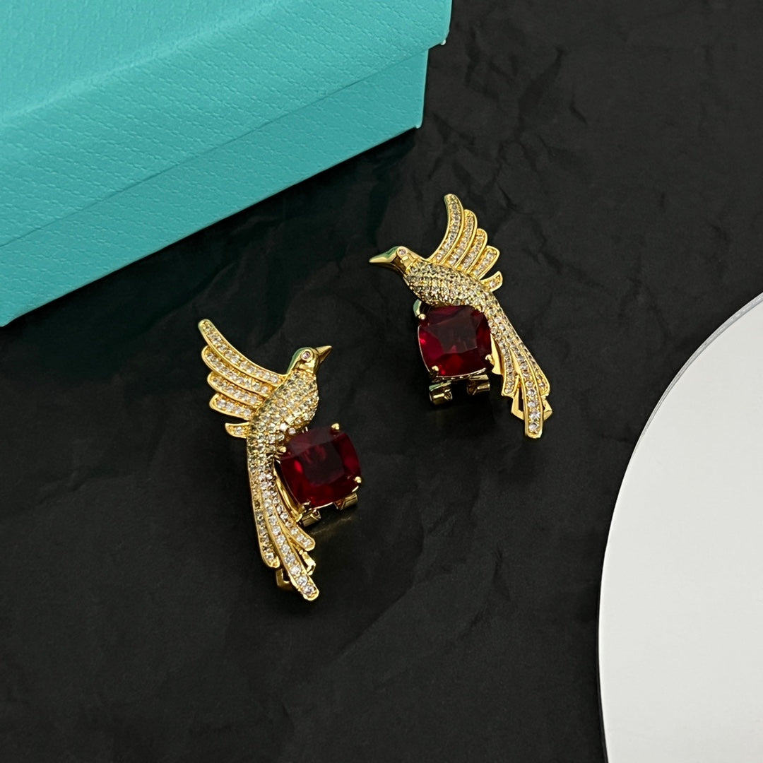 Boucles d'oreilles T Bird en diamants 18 carats