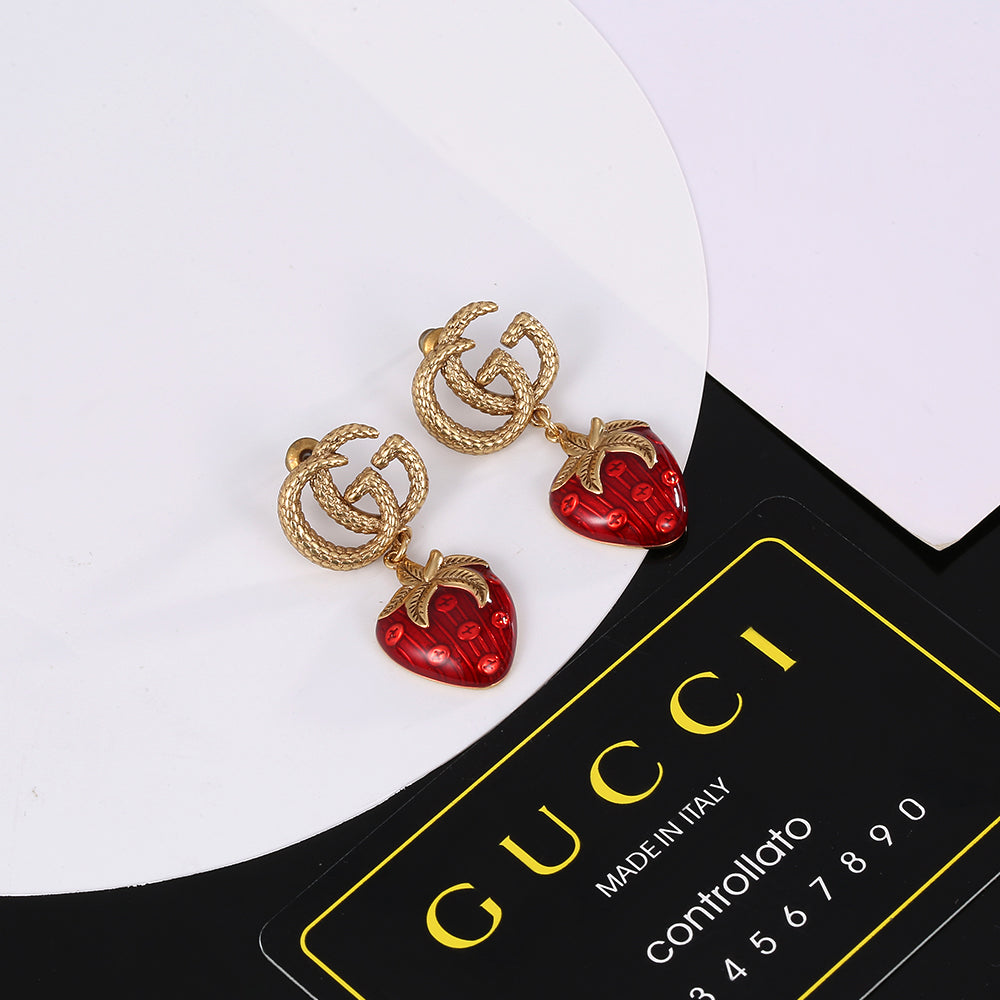 Boucles d'oreilles fraise Double G 18 carats