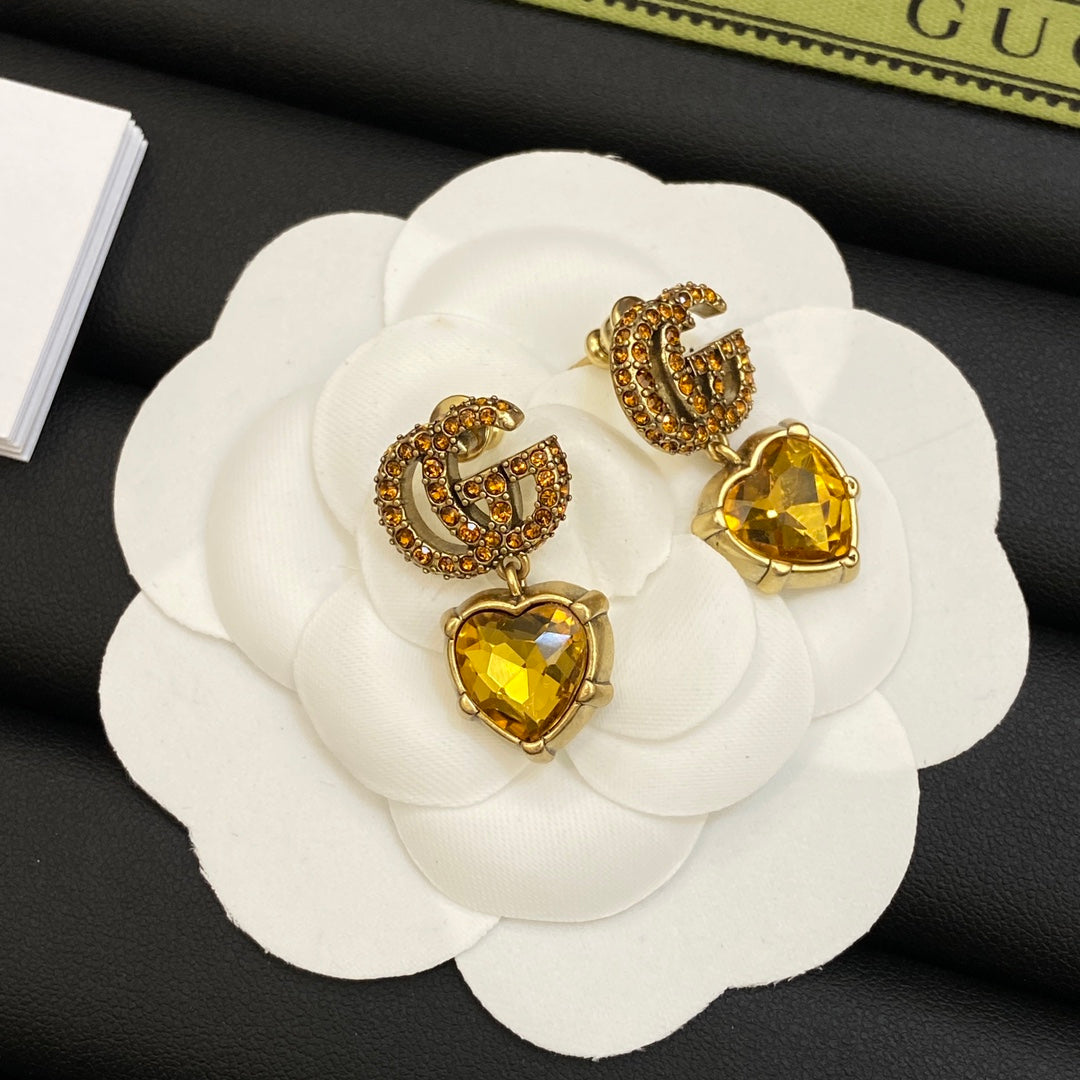 Boucles d'oreilles en cristal jaune Double G 18 carats