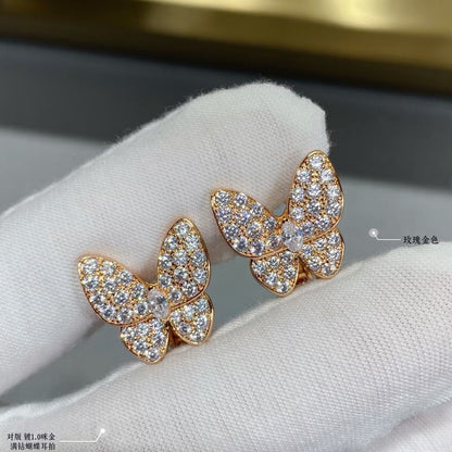 Boucles d'oreilles deux diamants papillon 18 carats