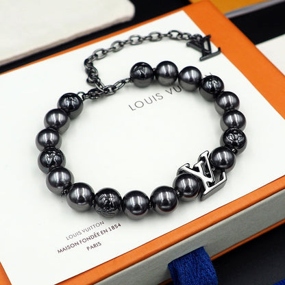 Bracelet de perles monogramme Louis 18 carats