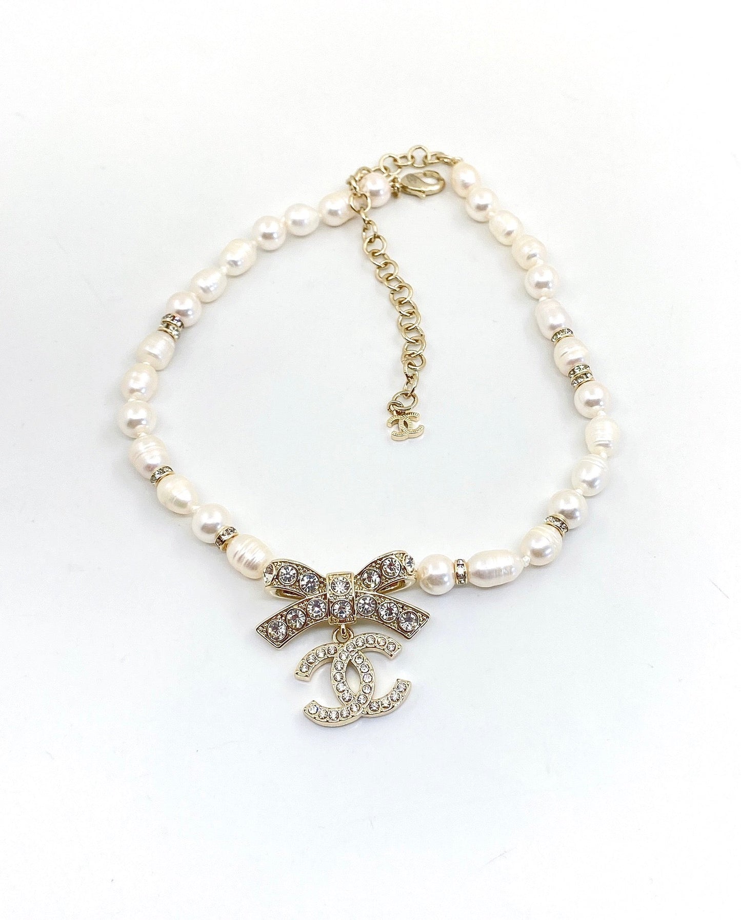 Collier diamants nœud papillon CC 18 carats