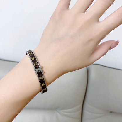 Bracelet vintage en cuir Louis 18 carats