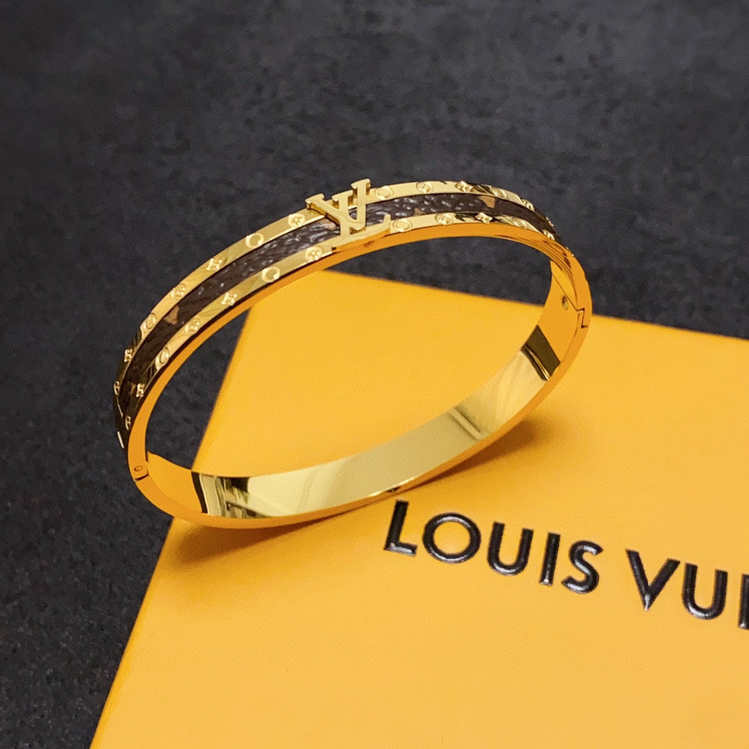 Bracelet vintage en cuir Louis 18 carats