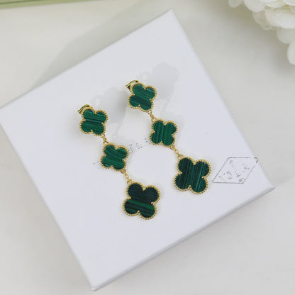 Boucles d'oreilles trèfle à trois motifs malachite Magic Alhambra 18 carats