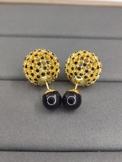 Boucles d'oreilles perles en résine effet pierre noire CD Tribales 18 carats