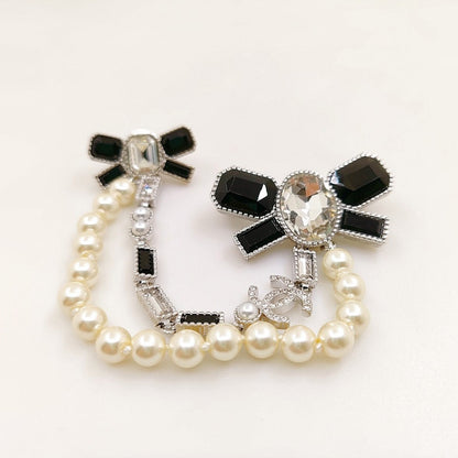 18K CHANEL Black Bow Pearls Brooch