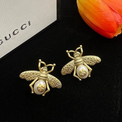 Boucles d'oreilles en perles d'abeille Double G 18 carats