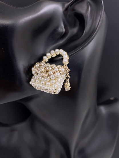 Boucles d'oreilles en perles de petit sac CC 18 carats