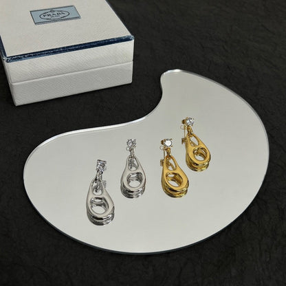 Boucles d'oreilles triangle inversé 18 carats