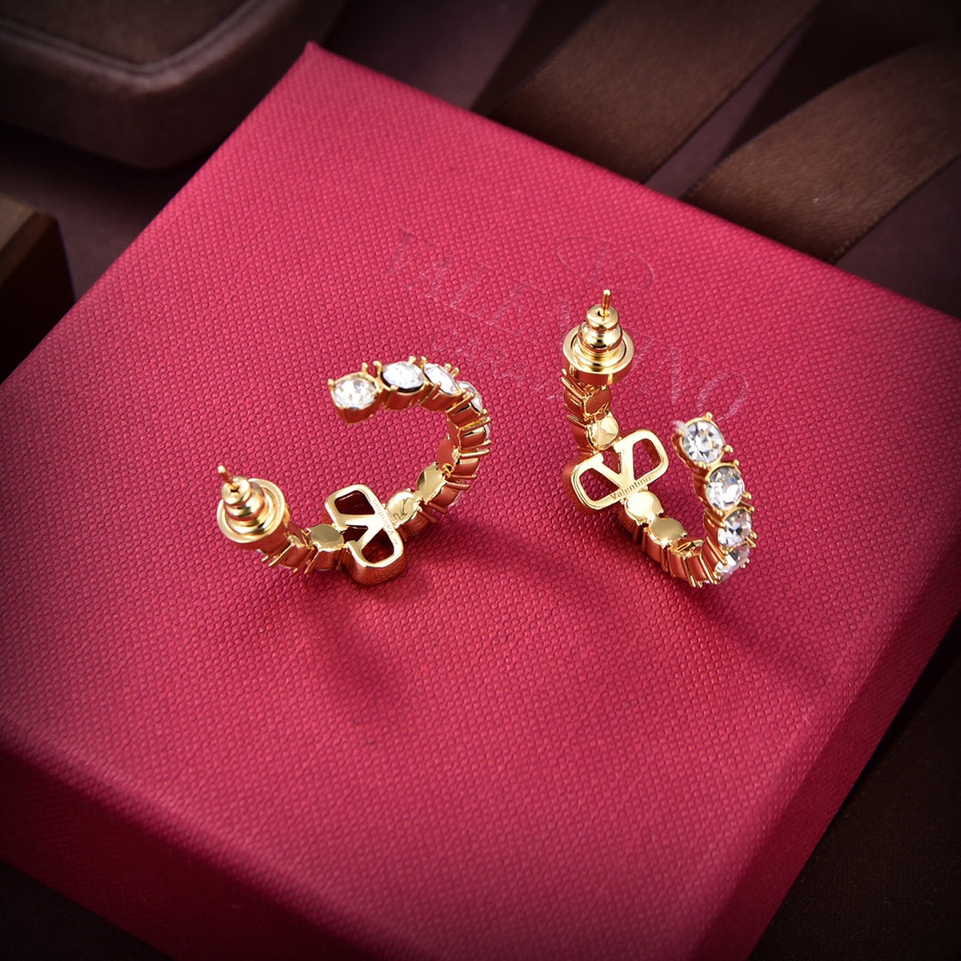 Boucles d'oreilles signature Garavani Vlogo 18 carats