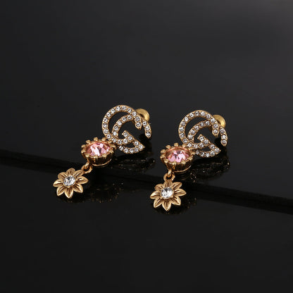 Boucles d'oreilles en cristal de fleur Double G 18 carats