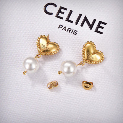 Boucles d'oreilles perles coeur Triomphe 18 carats